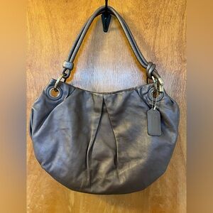 Gorgeous vintage Coach pewter “O” ring genuine leather shoulder bag